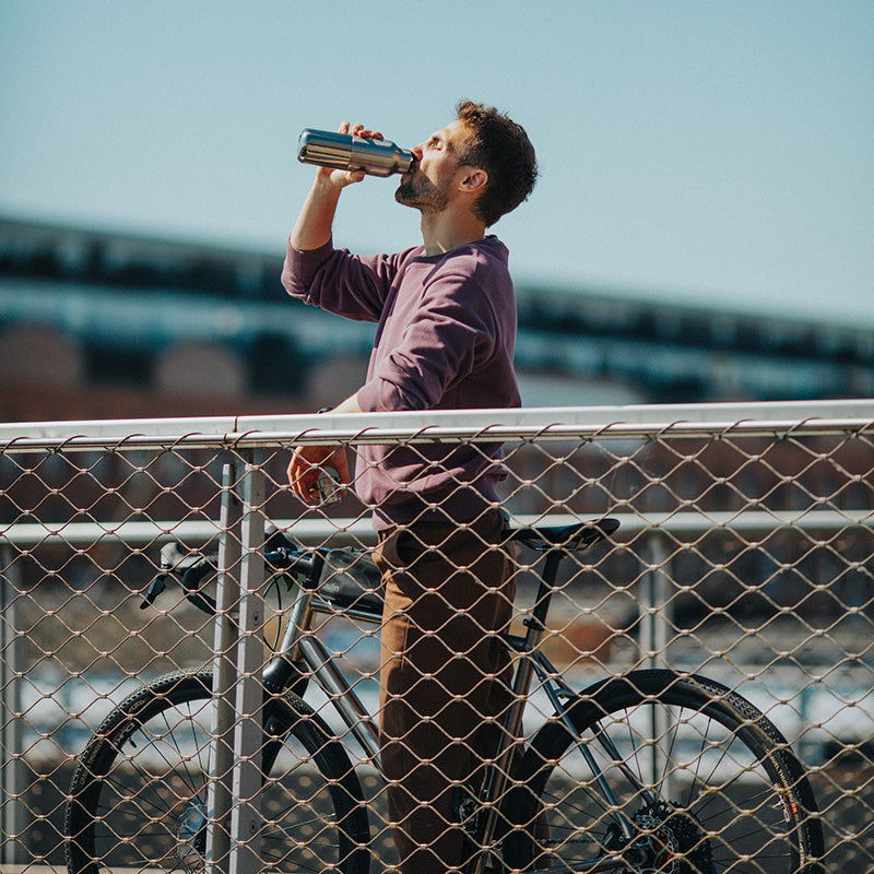 12oz-rise-reflect-with-bamboo-cap-i7 16oz_rise_reflect_man_bike_square.jpg