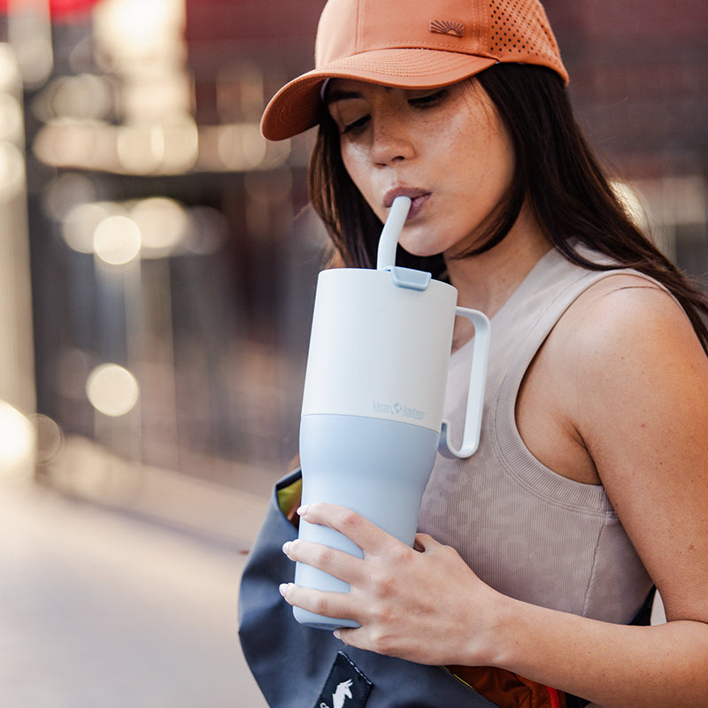 36oz-rise-tumbler-with-straw-lid-s8 36oz_rise_tumbler_straw_girl_sip_square.jpg