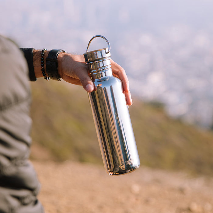 27oz-reflect-with-bamboo-cap-v8 K27SSLRF-MS-BAMBOO_reflect_bottle_hand_lifestyle.jpg