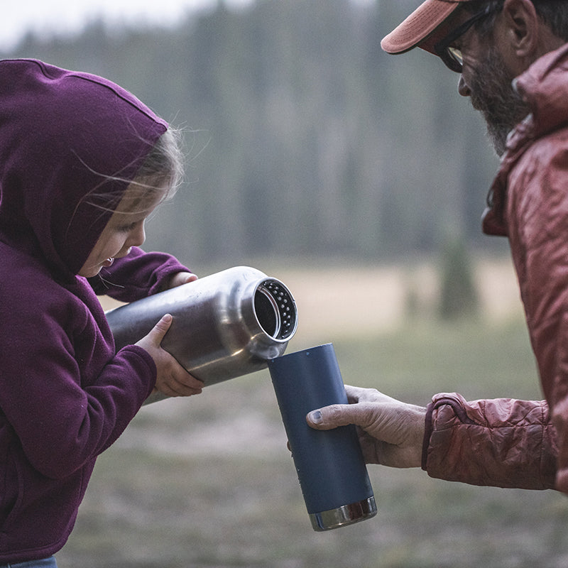 64oz-tkwide-with-loop-cap-v8 tkwide_64oz_bottle_girl_dad_filling_square.jpg